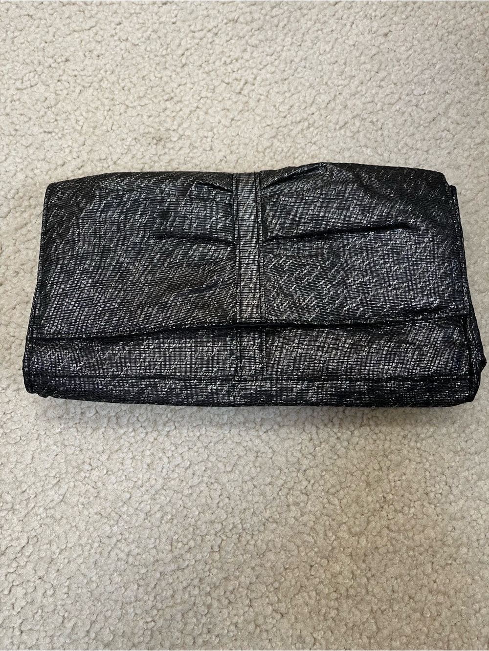 Silver /Black clutch  purse. Snap closure. 
Extremely lightweight. 
9” long